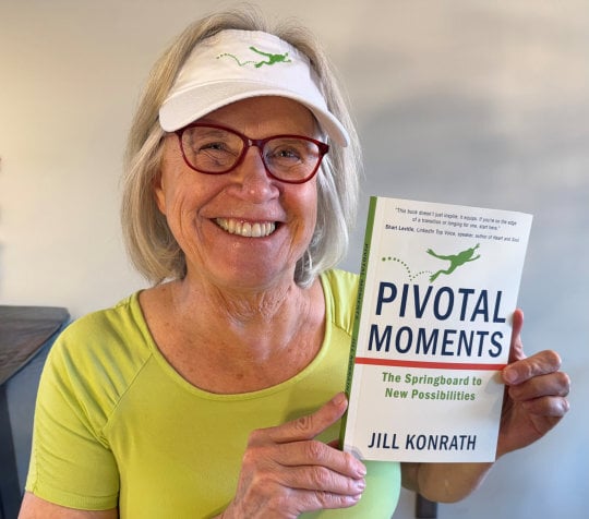 Jill holding Pivotal Moments